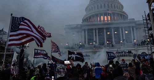 Poliser var med och stormade kongressen – grips och tas ur tjänst