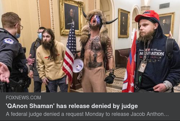 Kvarhållen QAnon Shaman